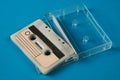 Blank cassette tape box with retro cassette on blue background