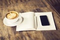 Blank cell phone, cup of coffee Royalty Free Stock Photo