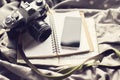 Blank cell phone, old style camera, blank diary and a book Royalty Free Stock Photo
