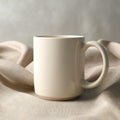 Blank Ceramic Mug CreamColored Coffee Cup on Linen Fabric Royalty Free Stock Photo