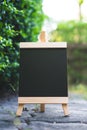 Blank chalkboard on green nature with copy space for your text m Royalty Free Stock Photo