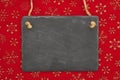 Blank chalkboard sign on snowflakes Royalty Free Stock Photo