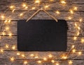 Blank Chalkboard sign with string lights Royalty Free Stock Photo