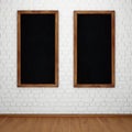 Blank chalkboard on white brick wall Royalty Free Stock Photo