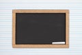 Blank chalkboard on white ruled line notebook paper background