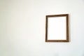 Blank classic photo frame on empty wall