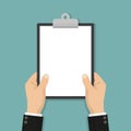 Blank clipboard in hands businessman. Empty space for text. Blank sheet white paper