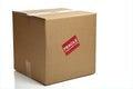 Blank Closed Cardboard Box with a Fragile Sticker Royalty Free Stock Photo