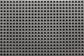 Blank plastic pegboard texture background with copy space Royalty Free Stock Photo