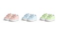 Blank colored baby shoes mockup pair, half-turned view