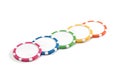 Blank colored plastic round chip mockup lying row, side view. Royalty Free Stock Photo