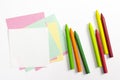 Blank colorful note paper with wav pencils isolated on white