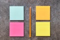 Blank colorful posts it note and pencil, flat lay, close up