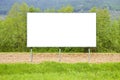 Blank commercial advertising billboard immersed in a rural scene - image with copy space