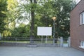 Blank commercial board in the garden for advertisement.