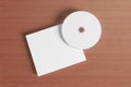 Blank compact disk cover on wooden background Royalty Free Stock Photo