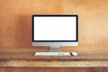 Blank Computer Monitor At Desk In home wood house Natural light