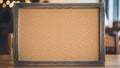 Blank Cork Board with Rustic Wooden Frame on Table and Bokeh Background Royalty Free Stock Photo