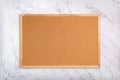 Blank corkboard on marble background. Cork pinboard on marble texture