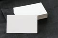 Blank corporate identity package business card with dark grey suit background. Royalty Free Stock Photo