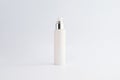 Blank cosmetic pump top silver bottle mock up on background