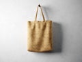 Blank cotton textile bag holding, neutral background. 3d render