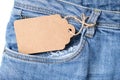 Blank craft cardboard label tag in a jeans denim pocket for sale and discount design