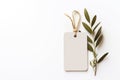 Blank craft paper gift tag. Label mockups with olive leaves Royalty Free Stock Photo