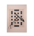 Blank crossword, eyeglasses and pen on white, top view