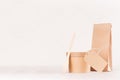 Blank different cardboard packaging for fast food - bag, cutlery, box, label of kraft paper on white wood shelf, copy space. Royalty Free Stock Photo