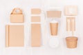 Blank different cardboard packaging for fast food - coffee cup, notebook, cutlery, sugar, spice, container and box for soup.
