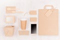 Blank different cardboard packaging for fast food - coffee cup, screen phone, cutlery, sugar, spice, container and box for sushi.