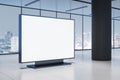 Blank digital display in modern office building with city view in background. 3D Rendering
