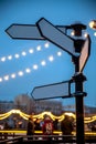 Blank directional road signs against blue sky. Royalty Free Stock Photo