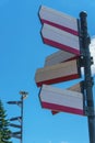 Blank directional road signs against blue sky. Directional sign post. Blue back Royalty Free Stock Photo