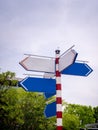 Blank directional road signs over blue sky Royalty Free Stock Photo