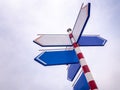 Blank directional road signs over blue sky Royalty Free Stock Photo