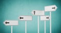 Blank directional signposts showing multiple paths and choices for navigation Royalty Free Stock Photo