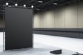 Blank display wall in an exhibition hall with spotlighting and modern interior. 3D Rendering Royalty Free Stock Photo