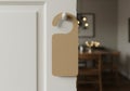 Blank door hanger providing space for personalization with ambient background Royalty Free Stock Photo