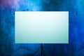 Blank Easel With White Canvas Near Multicolored Gradient Blue And Violet Walls. 3D rendering. Empty Space. Copy Space