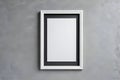 Blank empty picture frame mockup on gray cement wall. Royalty Free Stock Photo