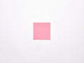 Blank or empty pink notepaper or notepad on white background Royalty Free Stock Photo