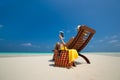 Blank empty tablet computer in the hands of women on the beach Royalty Free Stock Photo