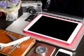 Blank empty tablet with travel objects Royalty Free Stock Photo