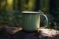 Blank enamel coffee cup mockup, camping mug in forest