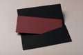 Blank envelope and black burgundy letter mockup, isolated on gray