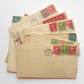 Blank envelope on pile of old letters, envelopes post stamps Royalty Free Stock Photo