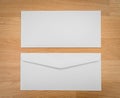 Blank envelopes on a wooden dark