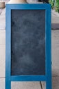 Blank erased chalkboard with blue wood border Royalty Free Stock Photo